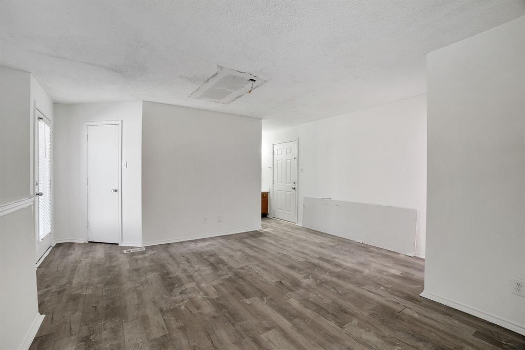 9821 Walnut Street, Unit 204 Dallas, TX 75243 - Photo 26 of 32 a view of an empty room