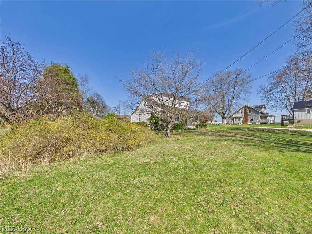 834 Lake Washington Road Washington, WV 26181 - Photo 14 of 20 View of Side and front yard