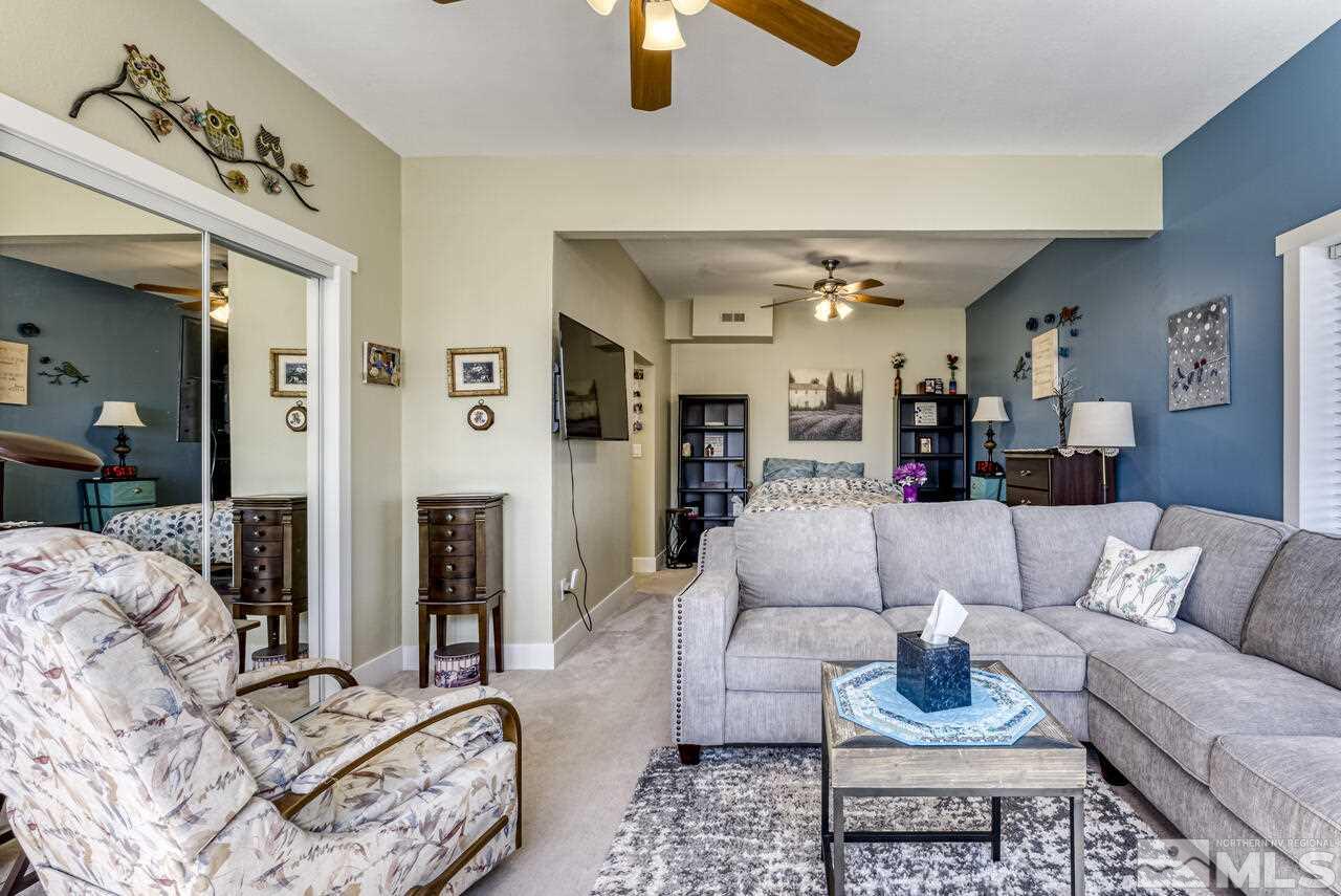 15555 Pyramid Way Reno, NV 89510 - Photo 23 of 39 a living room with furniture and wooden floor