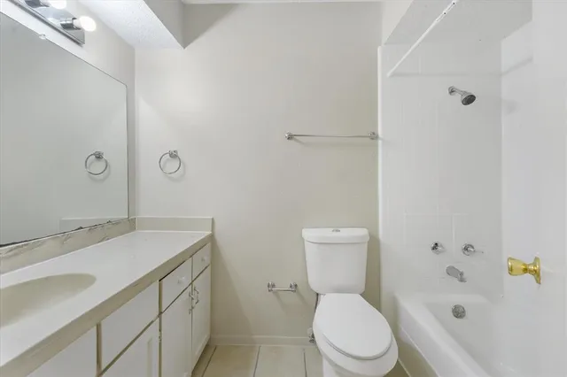 a view of a backyard with potted plants