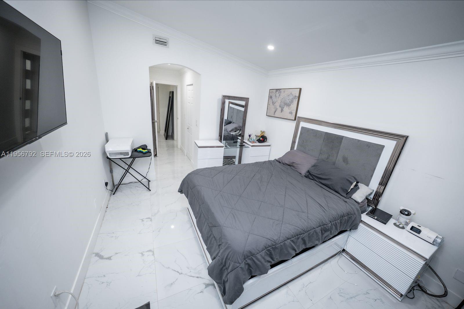 17404 Southwest 142nd Place Miami, FL 33177 - Photo 17 of 29 a living room with furniture and wooden floor