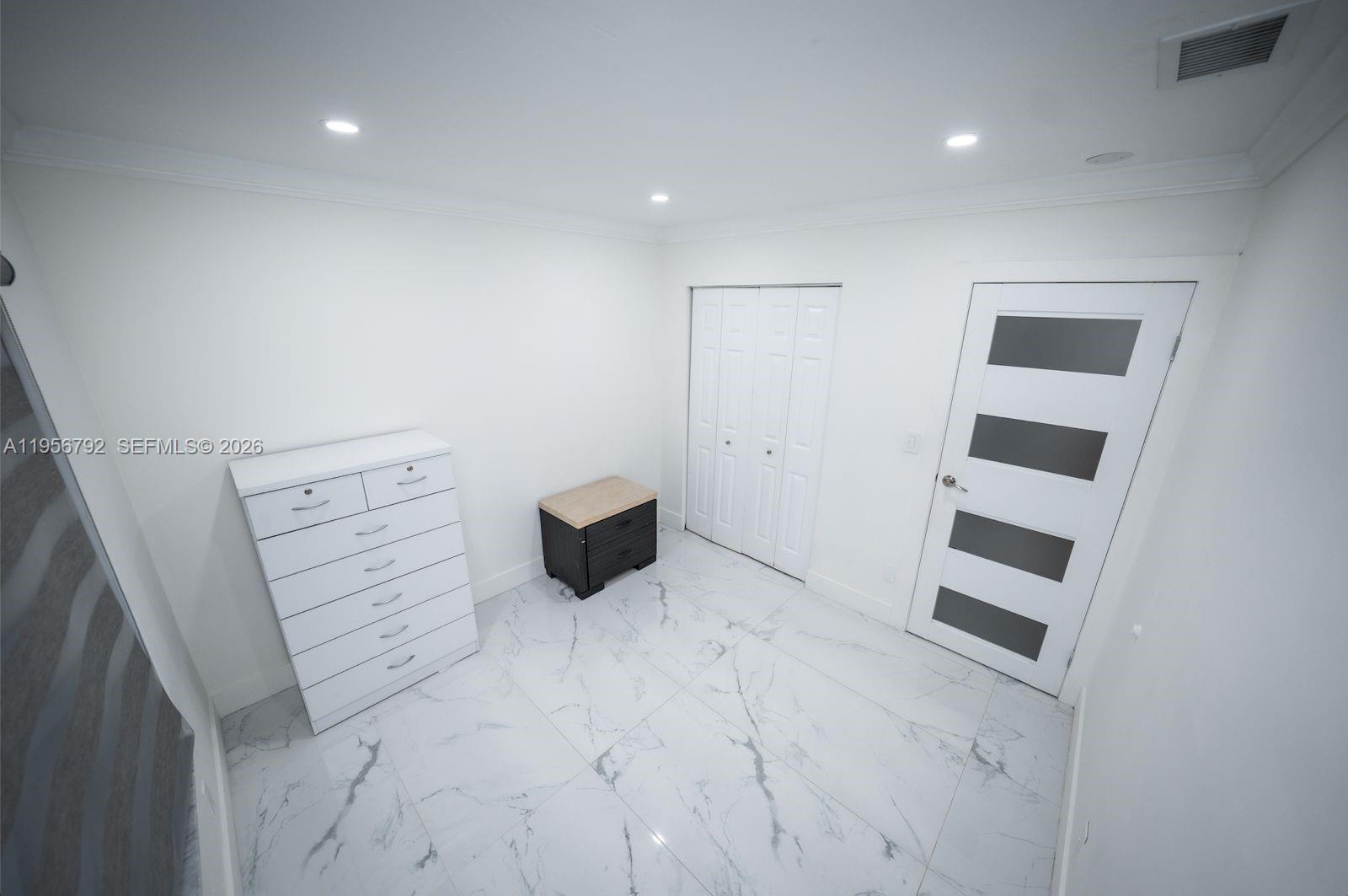 17404 Southwest 142nd Place Miami, FL 33177 - Photo 18 of 29 a view of an empty room