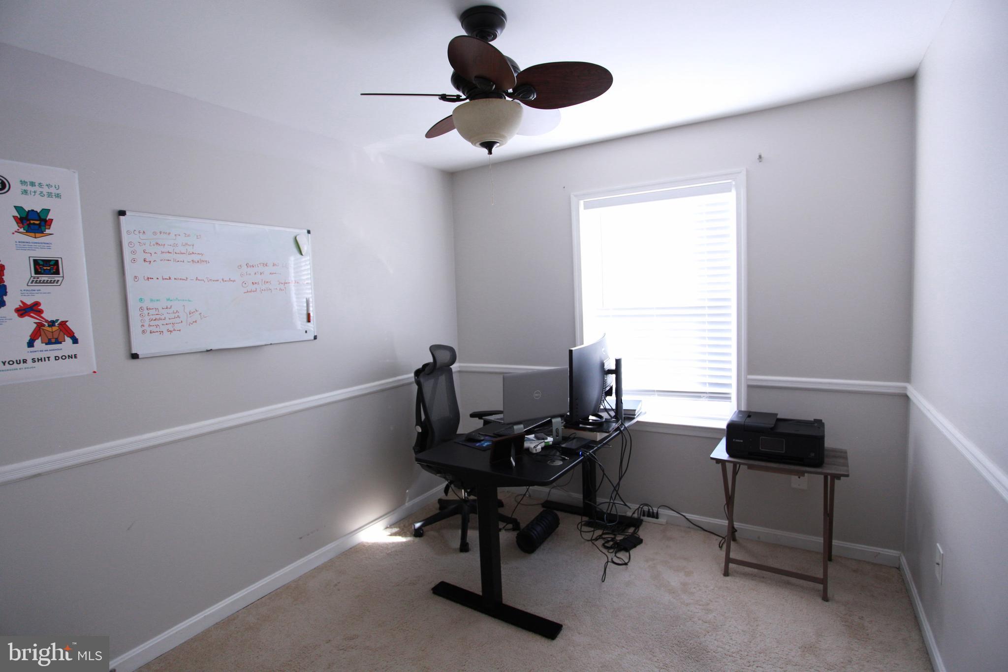 580 Primus Court Frederick, MD 21703 - Photo 12 of 14 a view of a workspace with furniture and a window