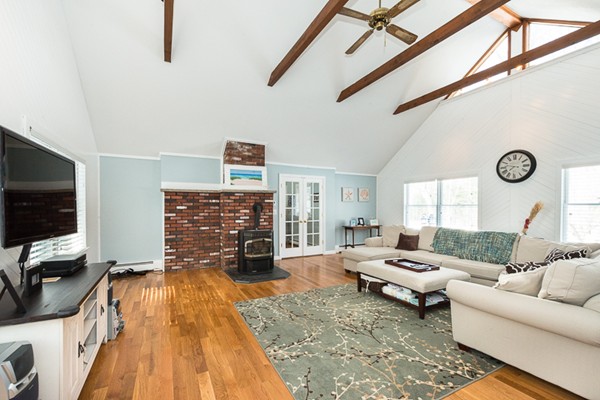 3 Pingree Farm Road Georgetown, MA 01833 - Photo 11 of 28 a living room with furniture and a flat screen tv