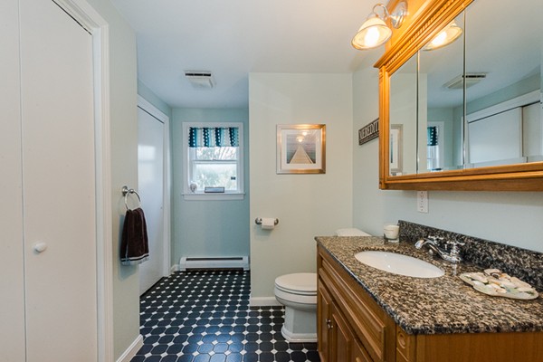3 Pingree Farm Road Georgetown, MA 01833 - Photo 18 of 28 a bathroom with a granite countertop sink and a mirror