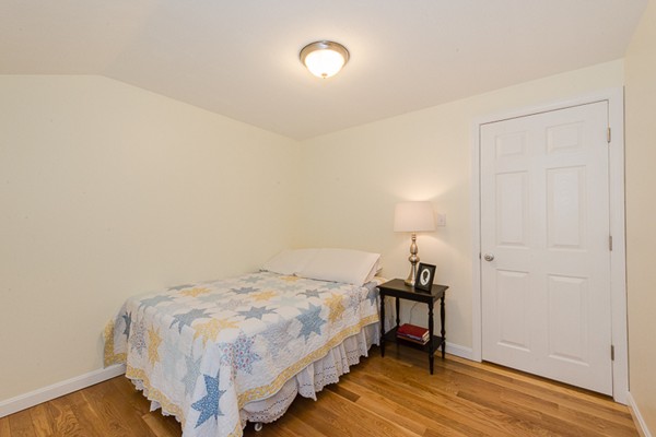 3 Pingree Farm Road Georgetown, MA 01833 - Photo 22 of 28 a bedroom with a bed and a table