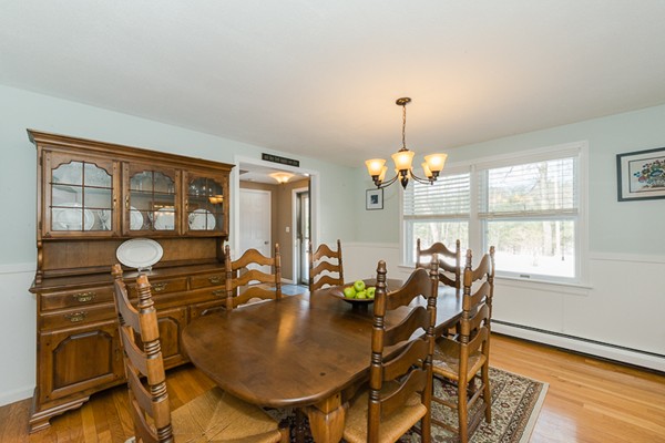 3 Pingree Farm Road Georgetown, MA 01833 - Photo 3 of 28 a view of a dining room with furniture and chandelier
