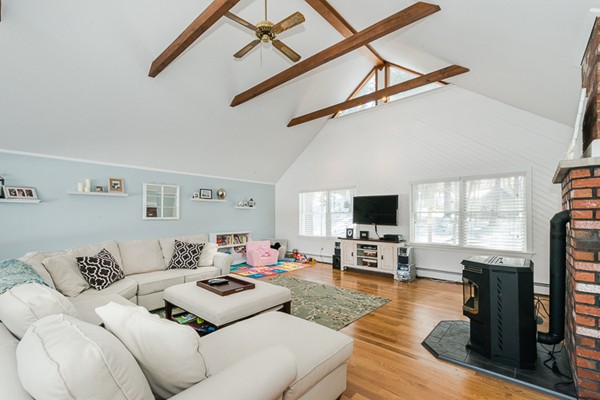 3 Pingree Farm Road Georgetown, MA 01833 - Photo 9 of 28 a living room with furniture and a flat screen tv