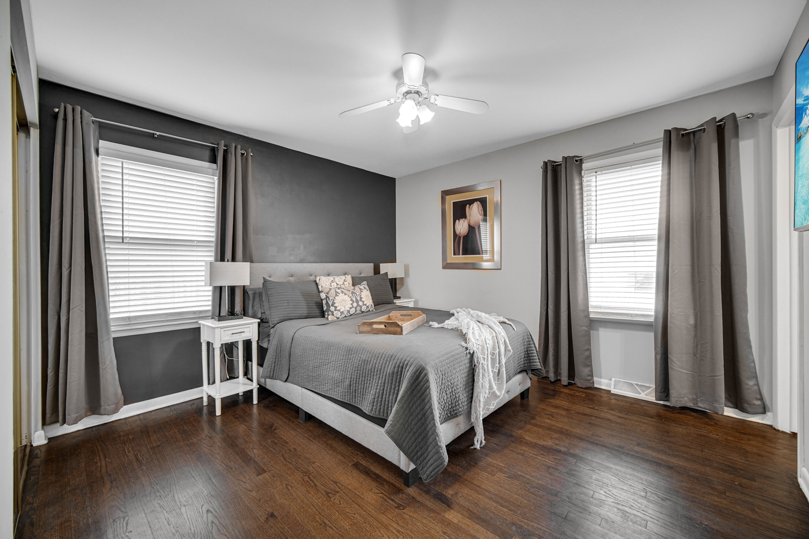 17509 Maple Avenue Lansing, IL 60438 - Photo 12 of 27 a bedroom with a large bed and a window