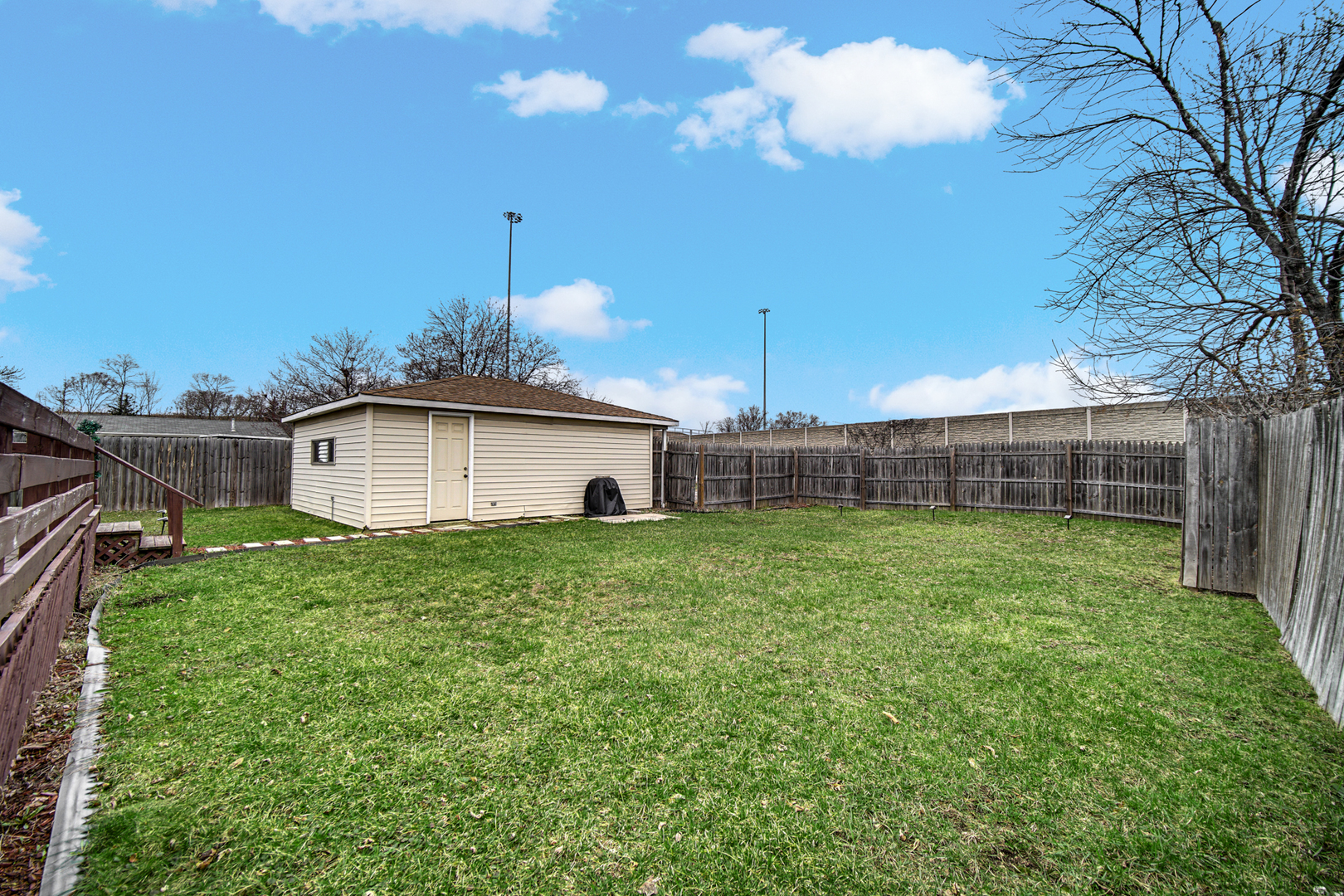 17509 Maple Avenue Lansing, IL 60438 - Photo 24 of 27 a view of a house with a yard