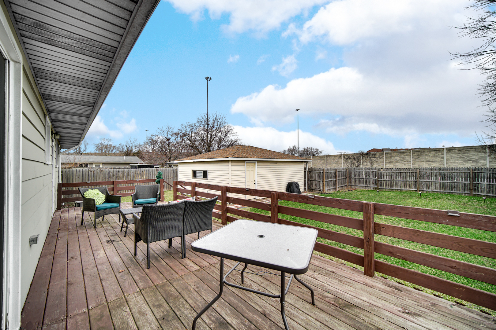 17509 Maple Avenue Lansing, IL 60438 - Photo 25 of 27 a view of a terrace with wooden floor and seating space