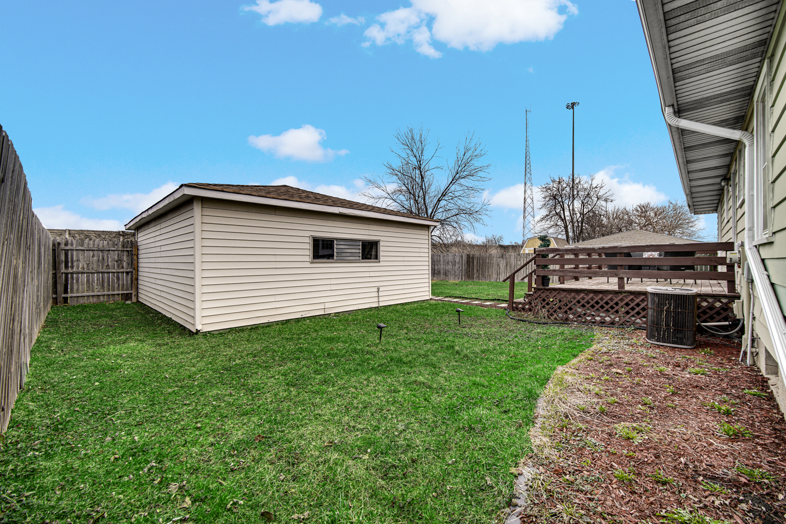 17509 Maple Avenue Lansing, IL 60438 - Photo 26 of 27 a view of a house with a yard