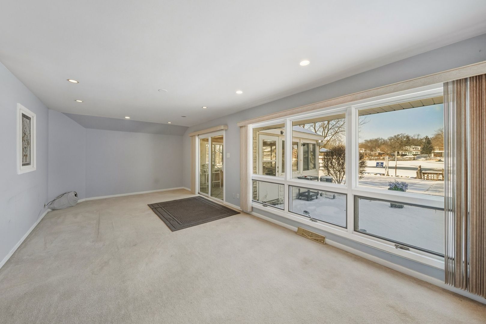 1515 North River Road McHenry, IL 60051 - Photo 19 of 27 a view of an empty room with window