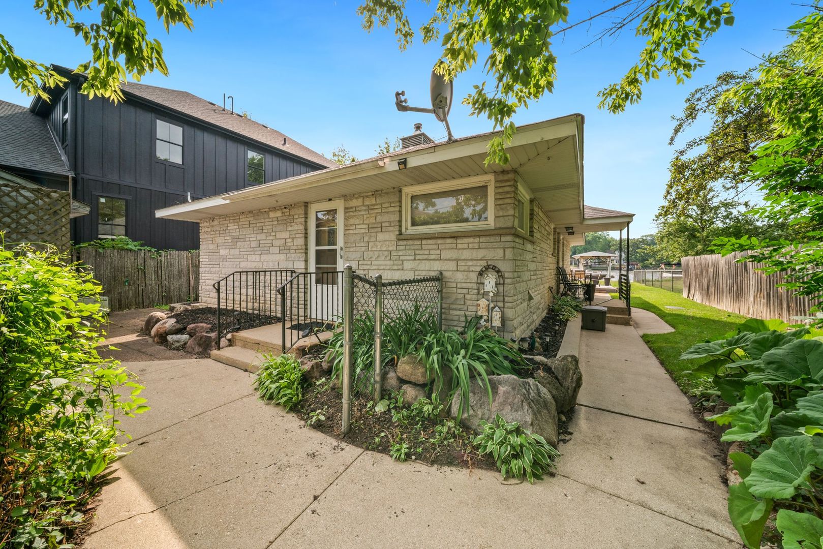 1515 North River Road McHenry, IL 60051 - Photo 2 of 27 a view of a back yard of the house