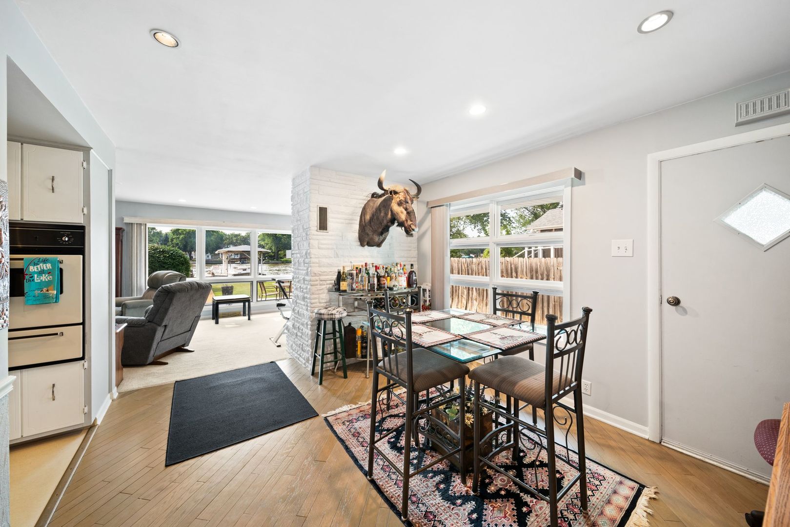1515 North River Road McHenry, IL 60051 - Photo 9 of 27 a view of a dining room with furniture and wooden floor