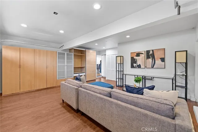 a living room with furniture and window