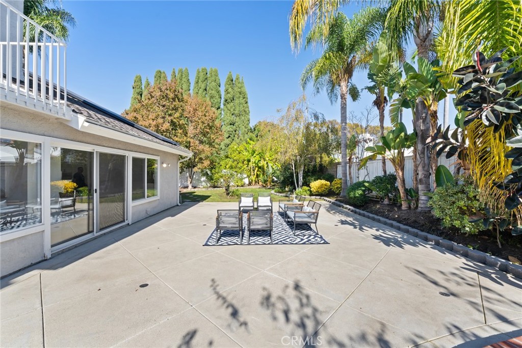 7 Boone Irvine, CA 92620 - Photo 33 of 38 a view of a patio with table and chairs and potted plants