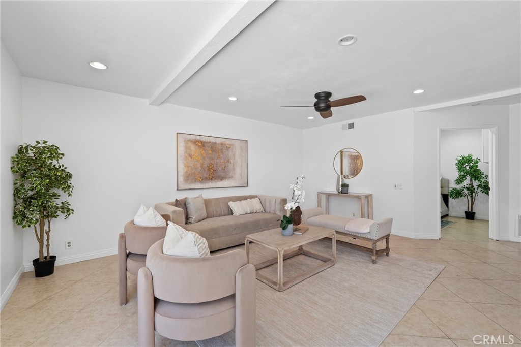 7 Boone Irvine, CA 92620 - Photo 9 of 38 a living room with furniture and a potted plant