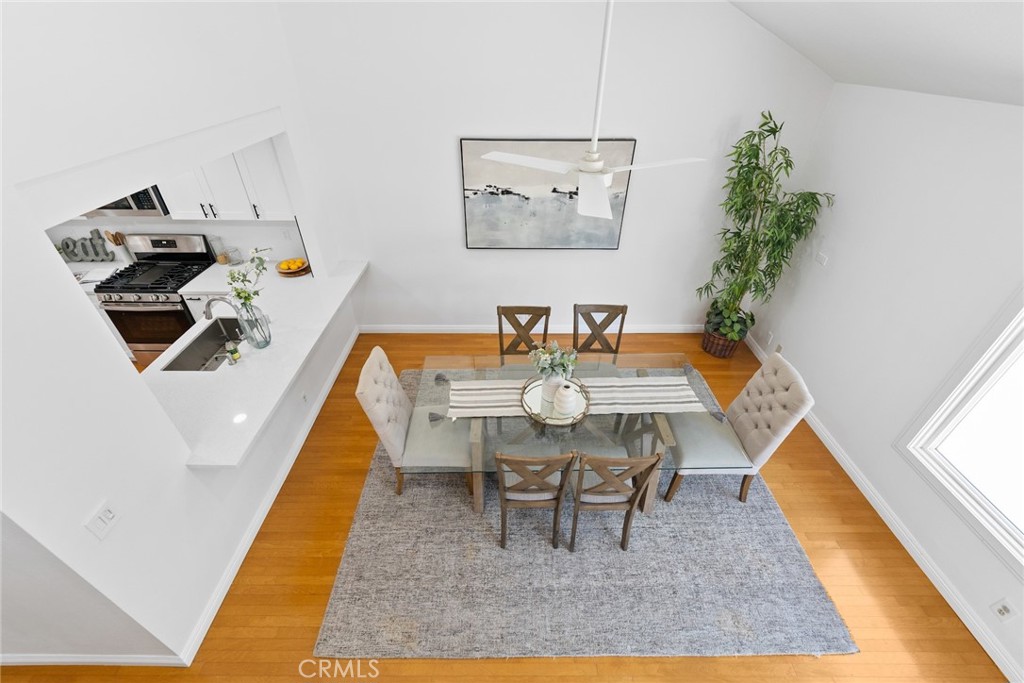 7 Boone Irvine, CA 92620 - Photo 10 of 38 a dining room with furniture and wooden floor