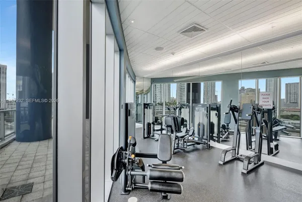 a view of a room with gym equipment