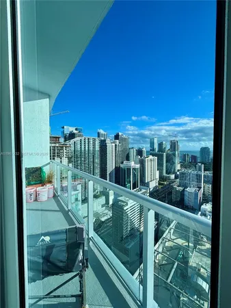 a view of balcony with furniture