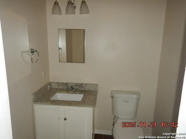 a bathroom with a sink and a toilet