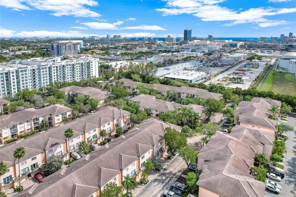 an aerial view of a city with lots of residential buildings
