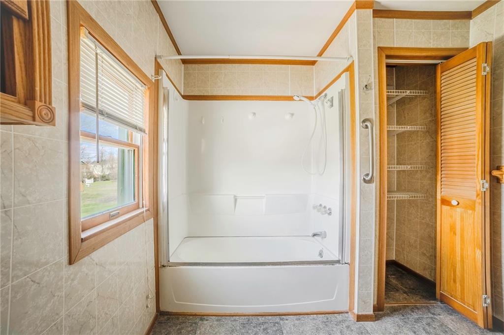 116 10th Street Lucerne Mines, PA 15754 - Photo 13 of 20 a view of walk in closet with bathroom and shower