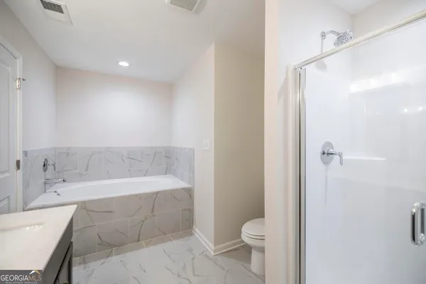 a view of small space with racks on the wall