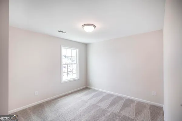 an empty room with an entryway