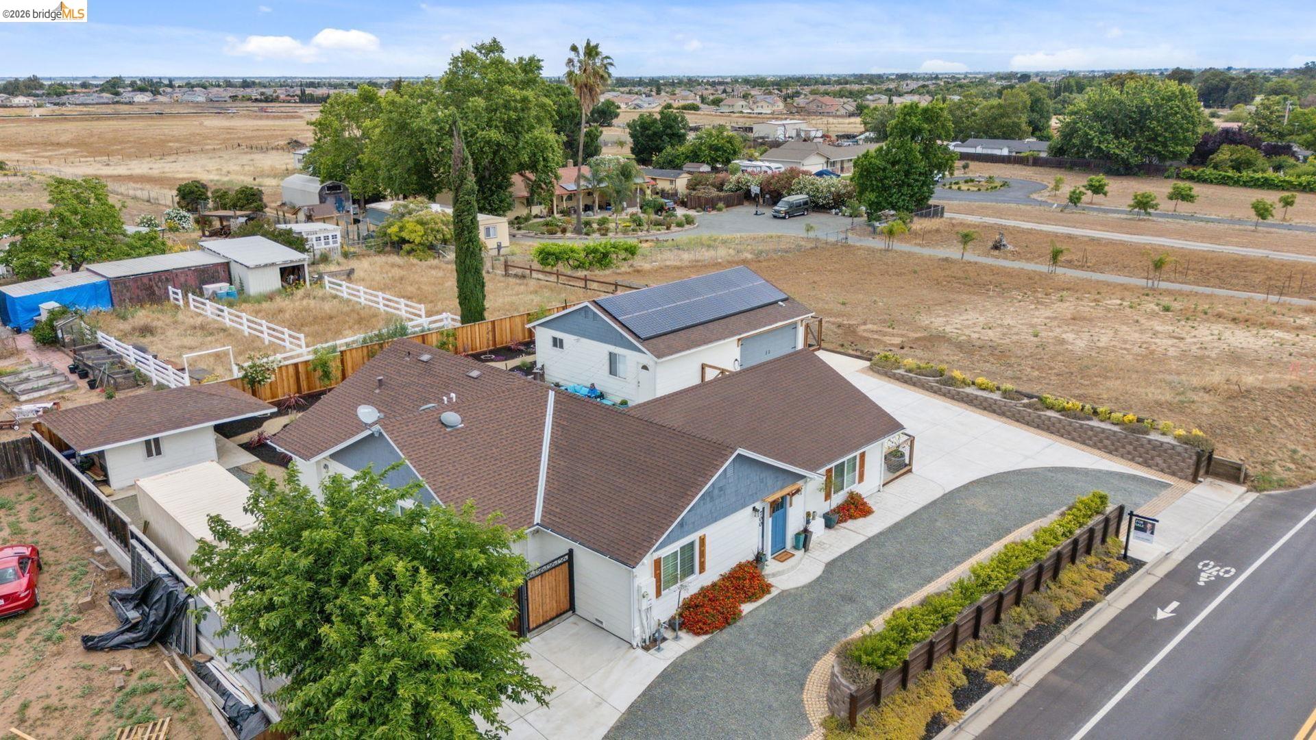 700 Brownstone Road Oakley, CA 94561 - Photo 7 of 58 an aerial view of a house with outdoor space and lake view