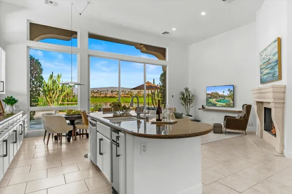 a view of a dining room with furniture window and outside view
