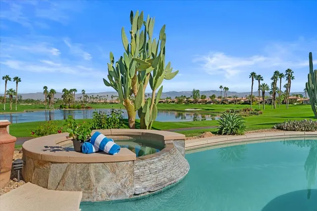 a view of a fountain in a yard with a fountain