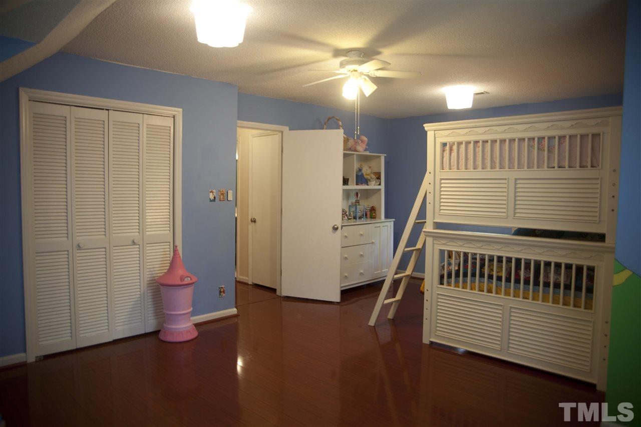 707 Torredge Road Durham, NC 27712 - Photo 14 of 21 a view of a livingroom with furniture stairs and windows