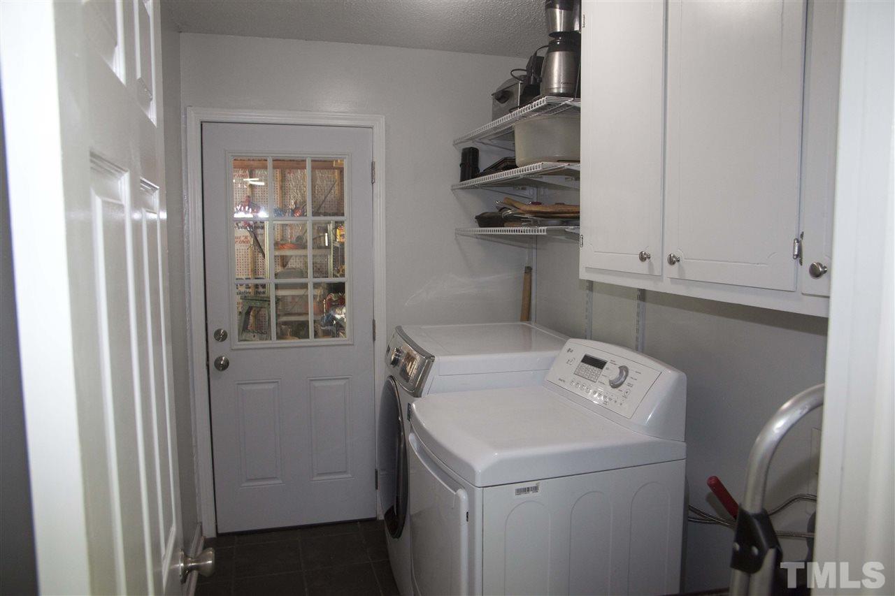 707 Torredge Road Durham, NC 27712 - Photo 8 of 21 a utility room with dryer and washer