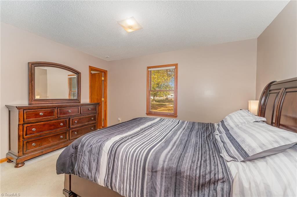587 Lee Road Thomasville, NC 27360 - Photo 12 of 24 Additional view of primary bedroom.