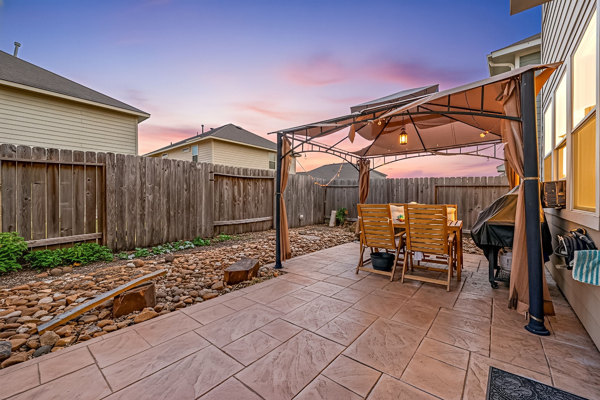 8917 Elm Drake Lane Humble, TX 77338 - Photo 3 of 25 a patio with table and chairs