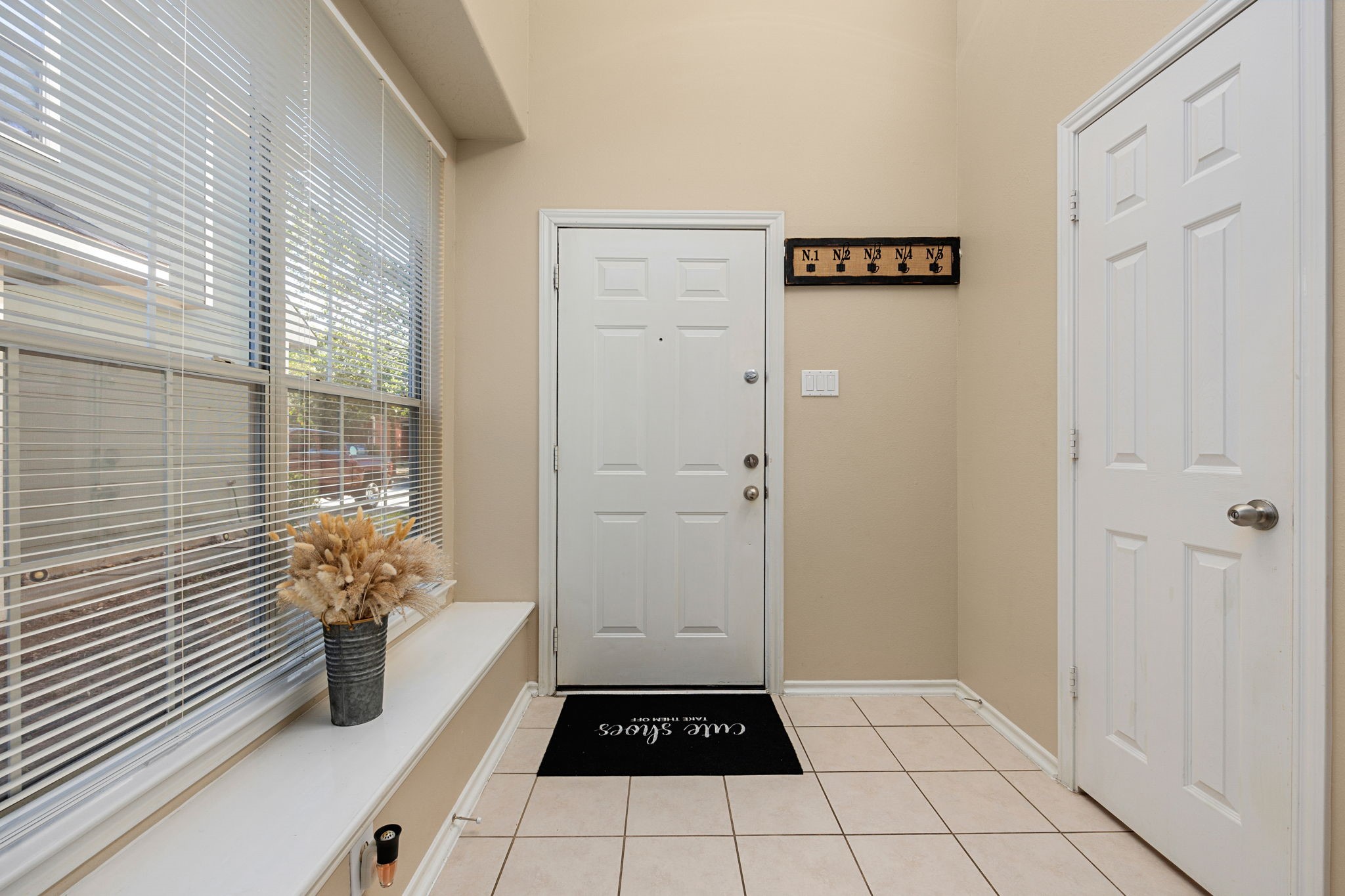 8917 Elm Drake Lane Humble, TX 77338 - Photo 4 of 25 a view of a entryway door of the house