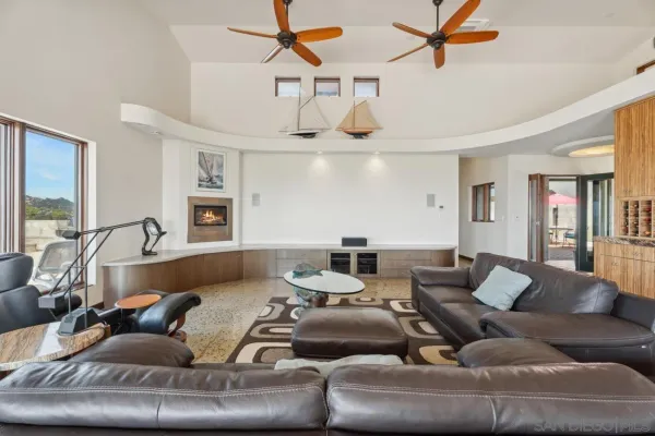 a view of a living room and kitchen view