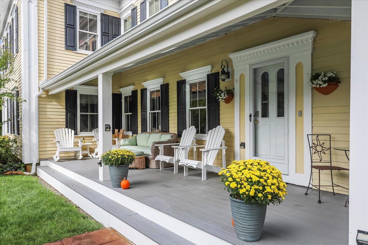 700 Samoset Road Eastham, MA 02642 - Photo 3 of 41 a front view of a house with outdoor seating and plants