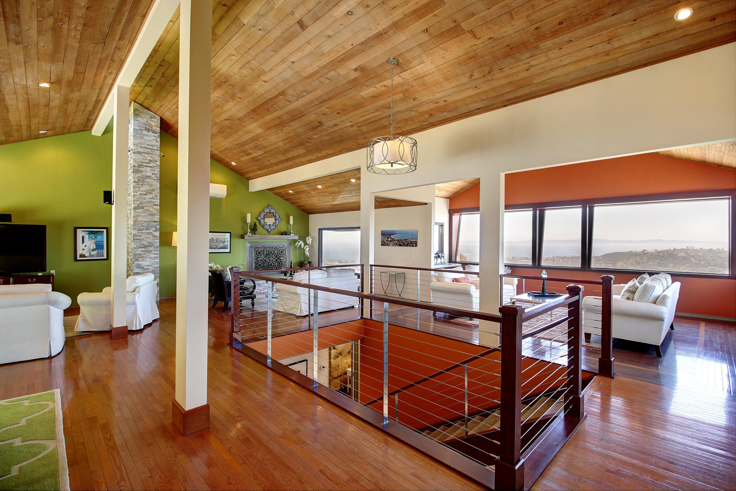 a view of a swimming pool with furniture
