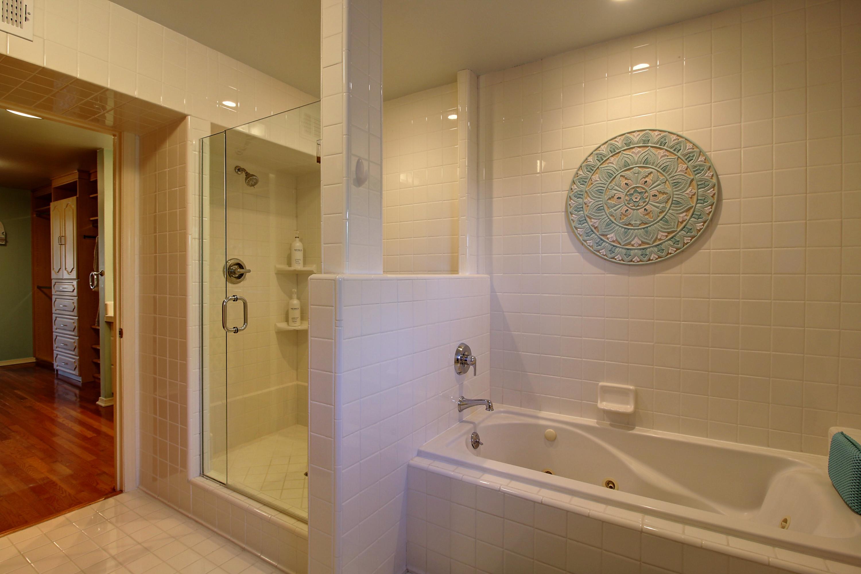 1710 Mission Ridge Road Santa Barbara, CA 93103 - Photo 14 of 27 a bathroom with a tub a sink and a shower