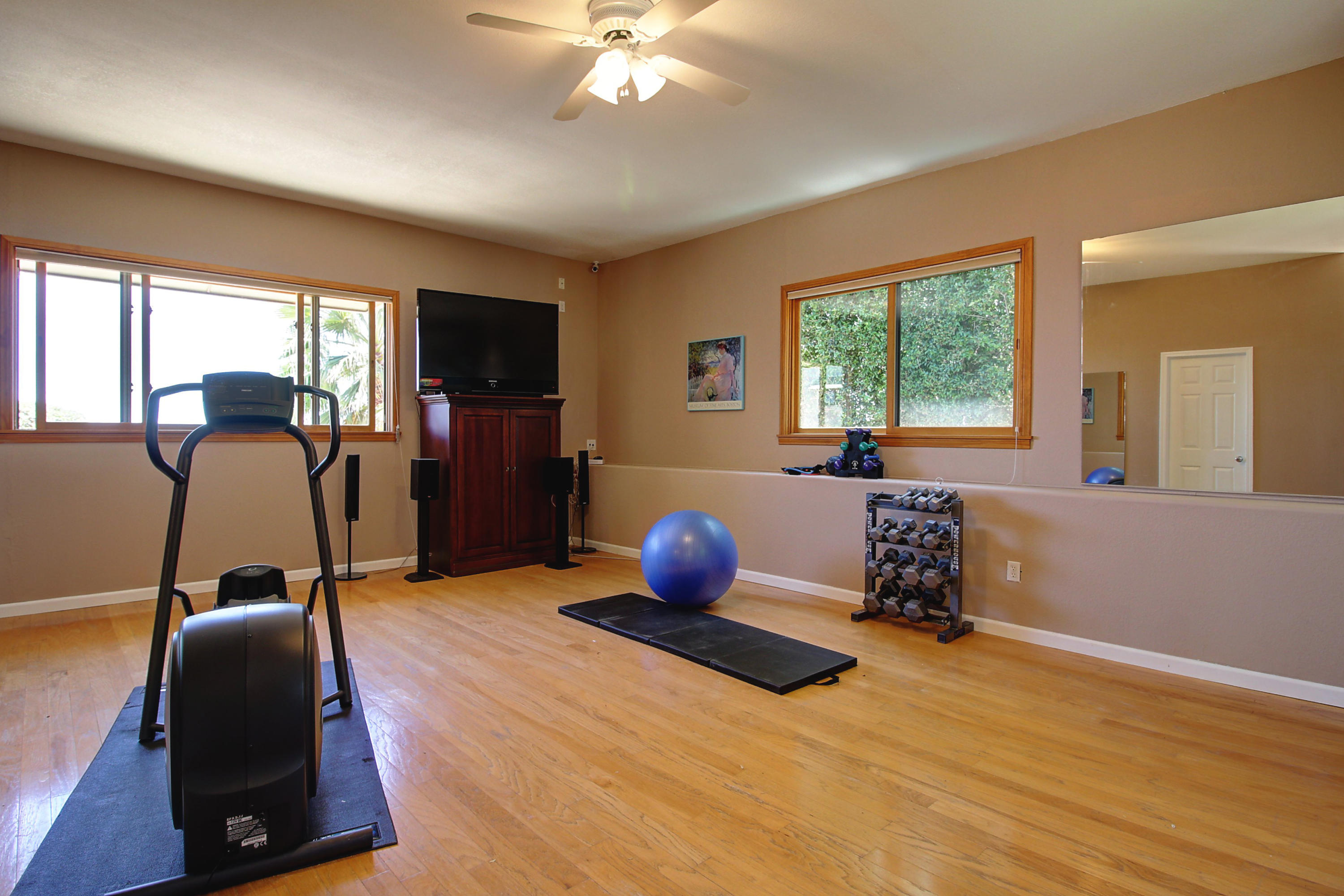 1710 Mission Ridge Road Santa Barbara, CA 93103 - Photo 18 of 27 a bedroom with furniture and window