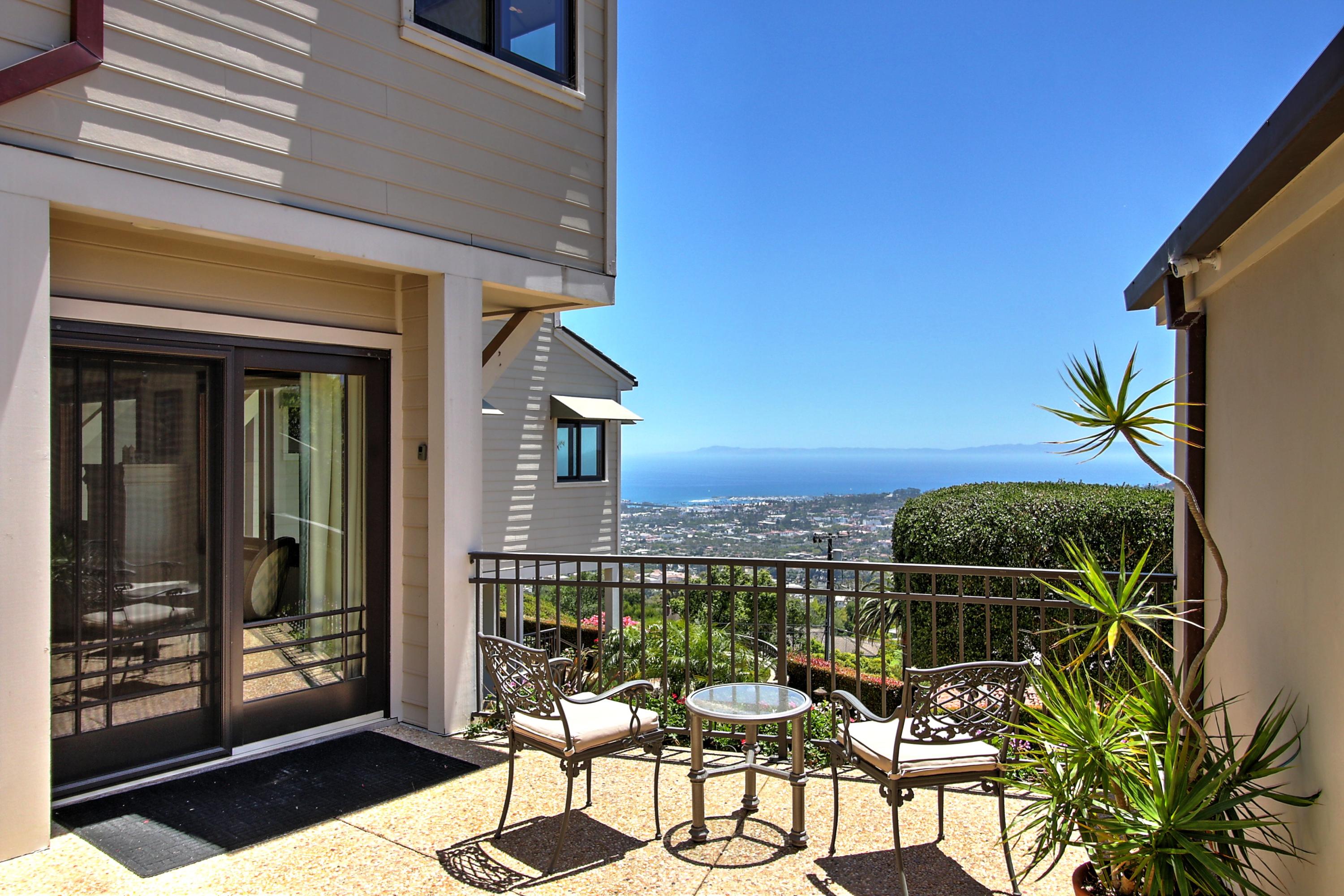 1710 Mission Ridge Road Santa Barbara, CA 93103 - Photo 19 of 27 a balcony with table and chairs