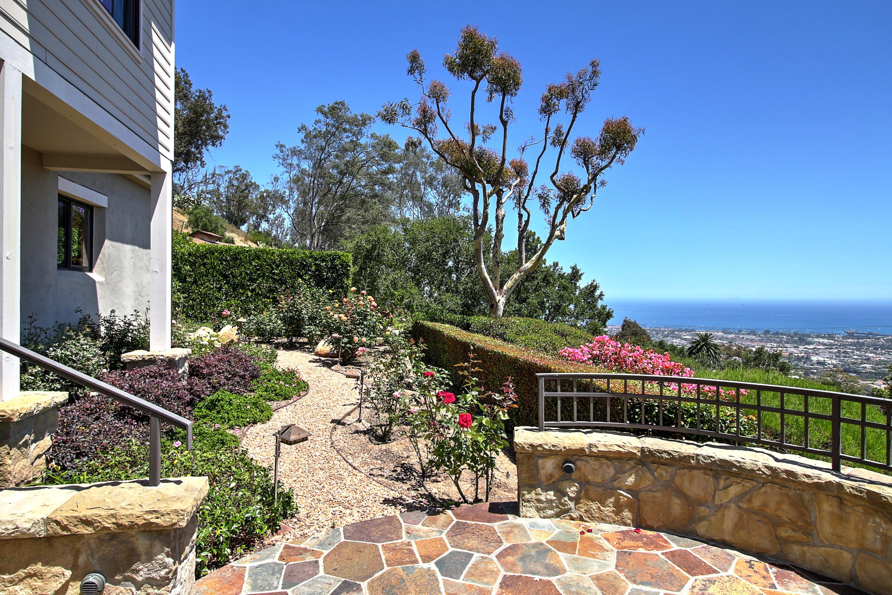 1710 Mission Ridge Road Santa Barbara, CA 93103 - Photo 3 of 27 a view of a fountain in front of a house