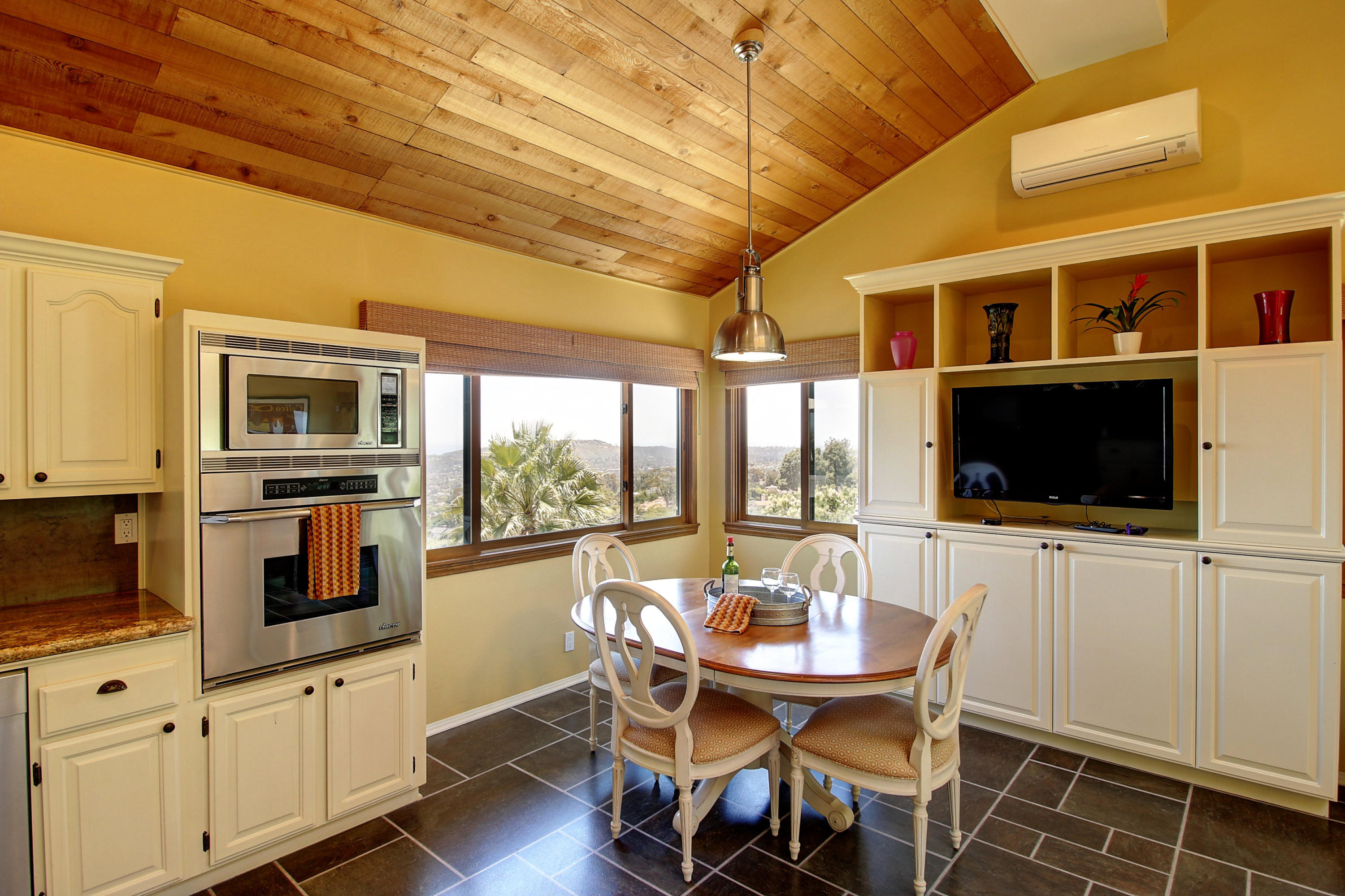 1710 Mission Ridge Road Santa Barbara, CA 93103 - Photo 9 of 27 a view of a dining room with furniture window and outside view