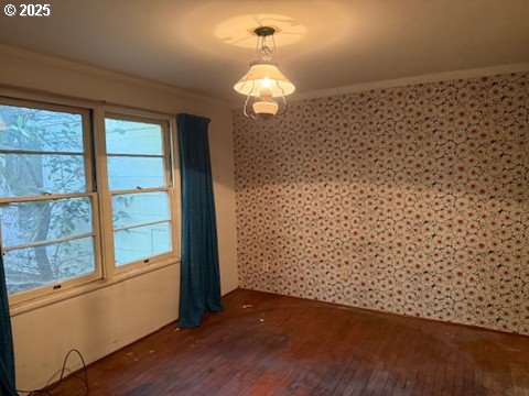 2010 East 26th Avenue Eugene, OR 97403 - Photo 11 of 12 wooden floor in an empty room with a window