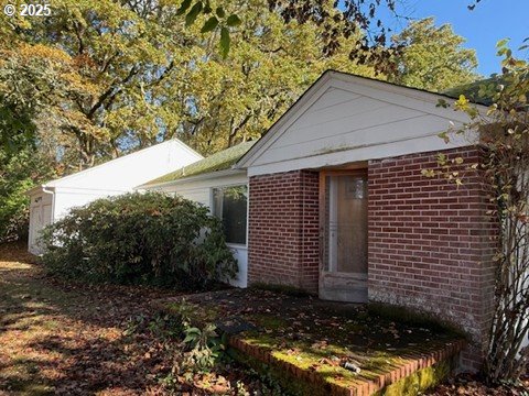 2010 East 26th Avenue Eugene, OR 97403 - Photo 2 of 12 a front view of a house with a yard