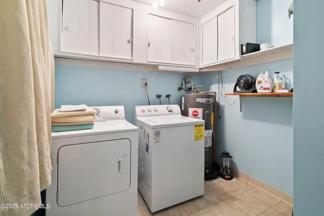 a backyard of a house with a garden and outdoor seating