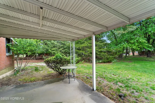a sign board with an ocean view